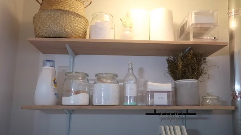 Wooden shelves in laundry closet