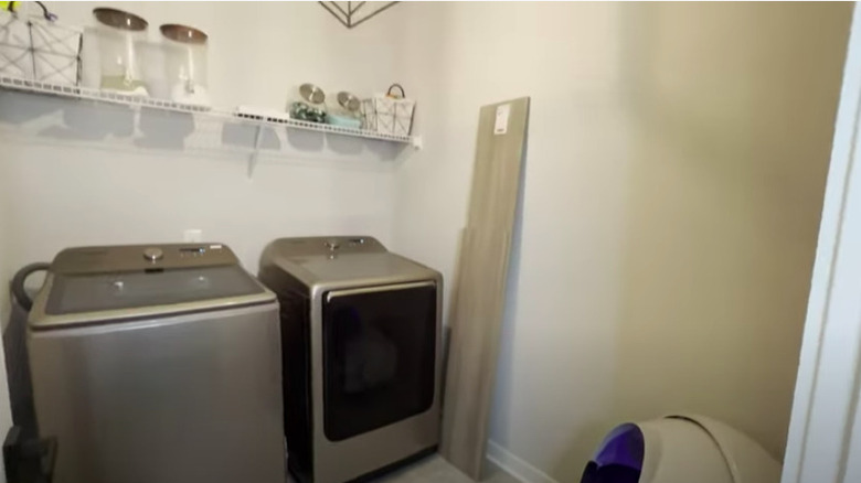 A laundry room with decanted products