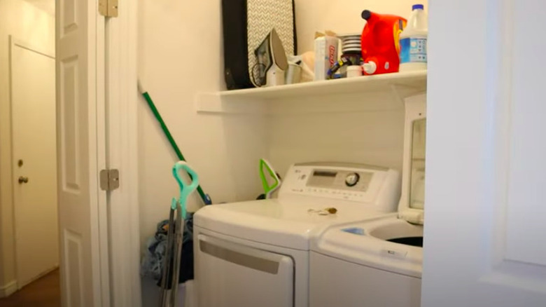 Cluttered laundry closet