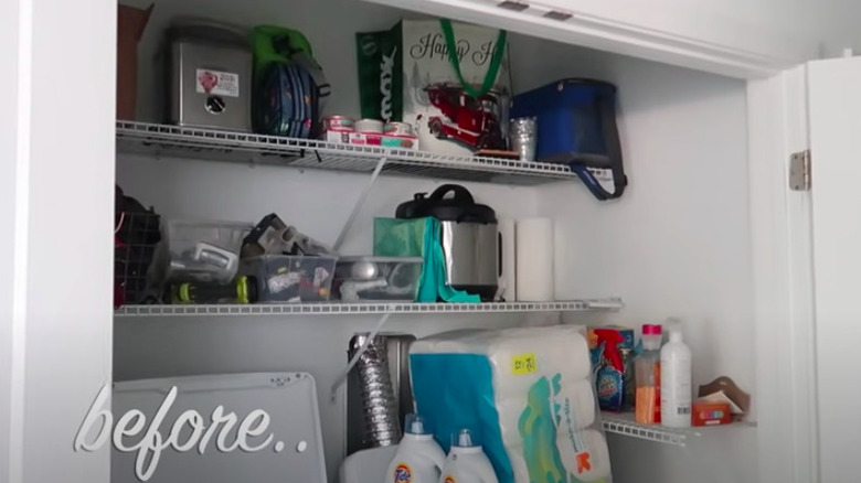 Disorganized laundry closet shelving
