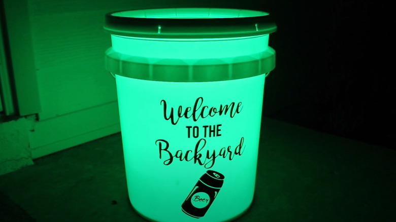 bucket lantern glowing green