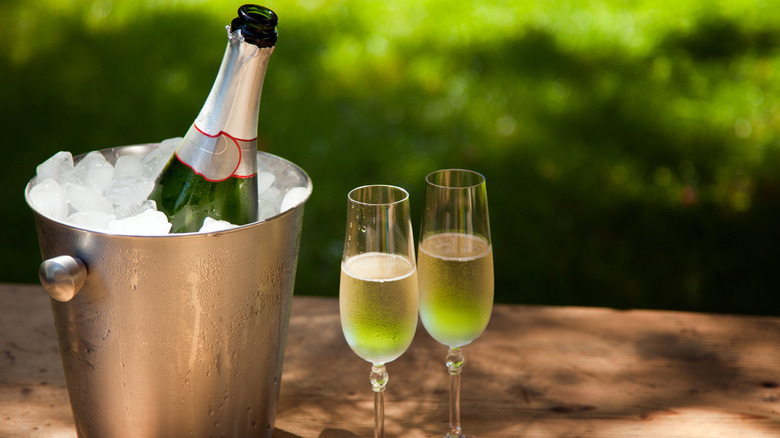 champagne bottle in ice bucket