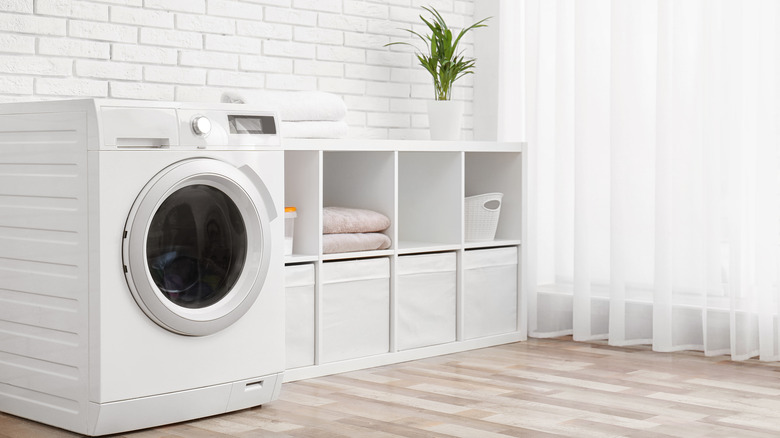 all white laundry room