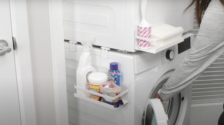 white magnet shelf on washer