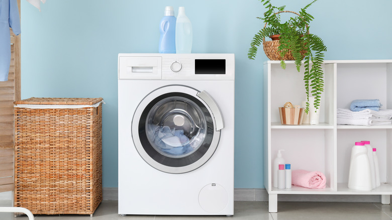 white box shelves near washer