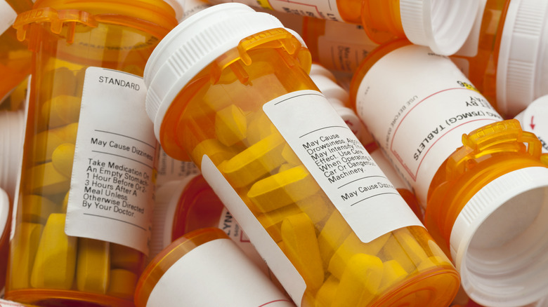 Pile of prescription pill bottles