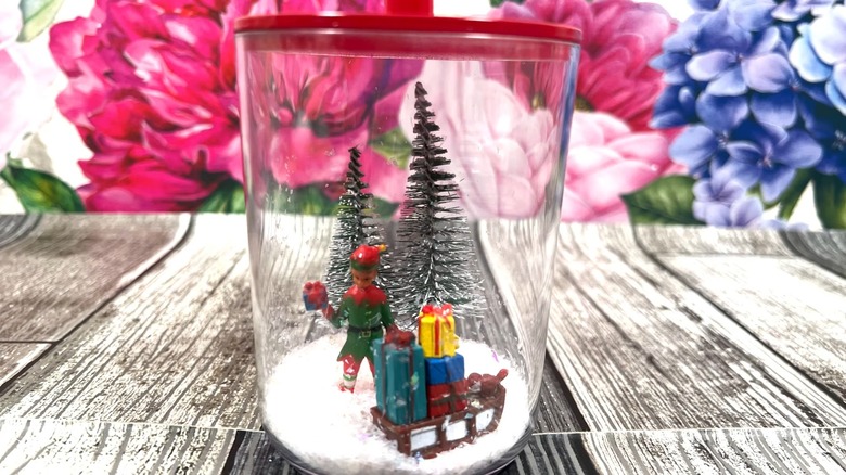 Homemade snow globe using a plastic jar