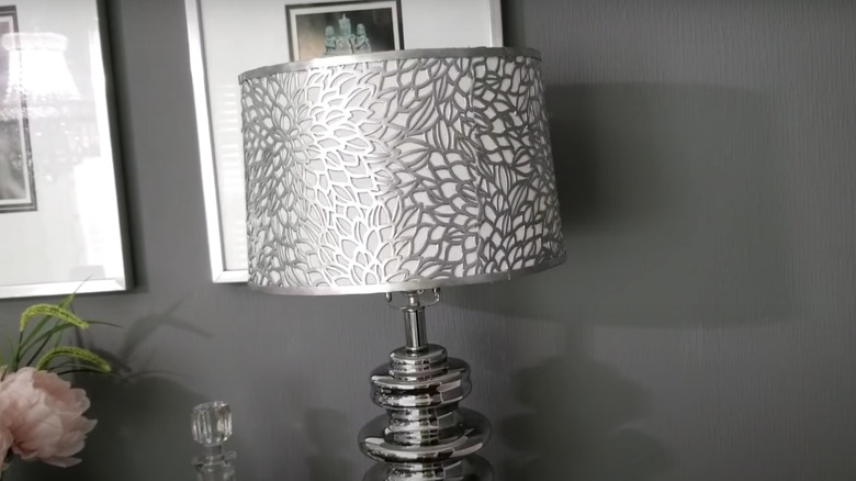 silver placemat on lampshade