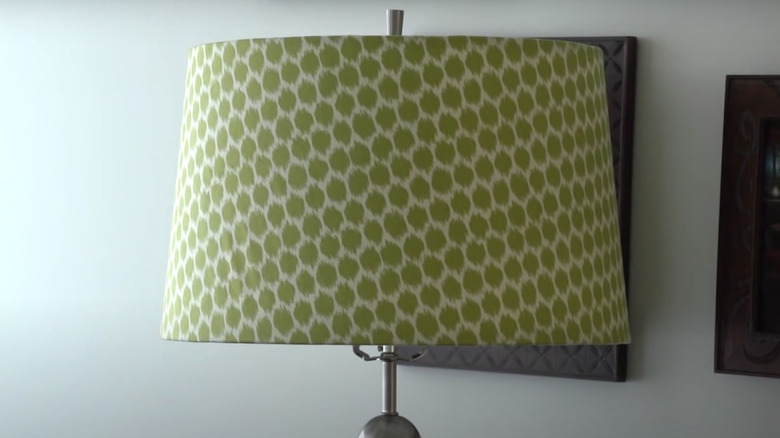 green fabric on large lampshade