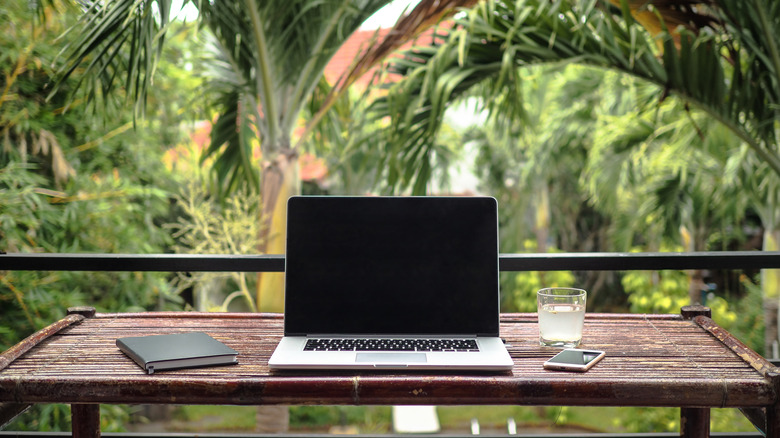 laptop on balcony