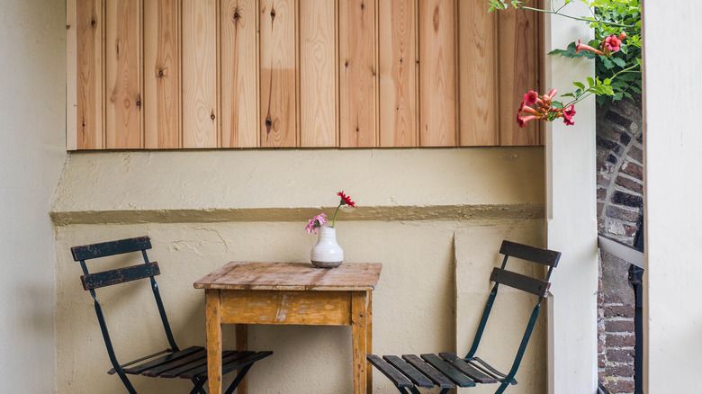 wooden wall above a table