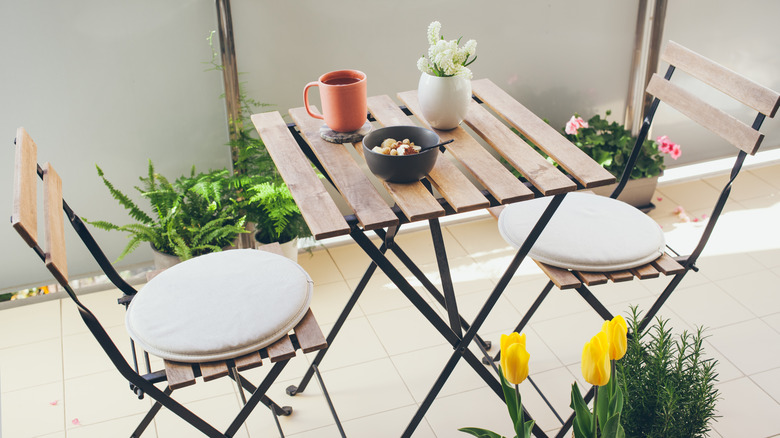 wooden table on balcony