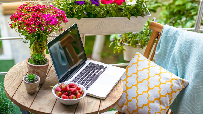 laptop on wooden table