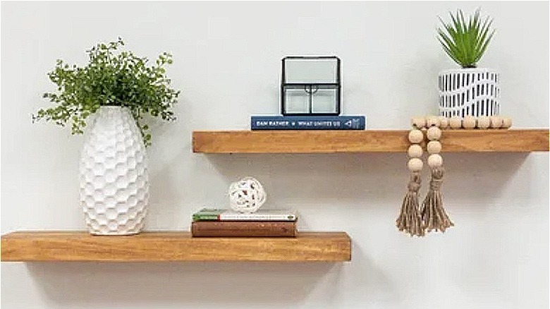 wooden floating shelves with decorations