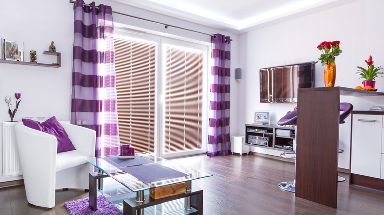 living room with purple décor