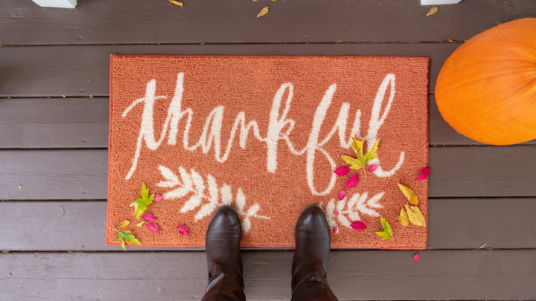 Orange "thankful" doormat 