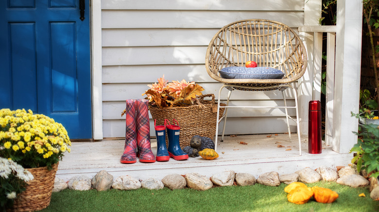 Woven basket behind boots