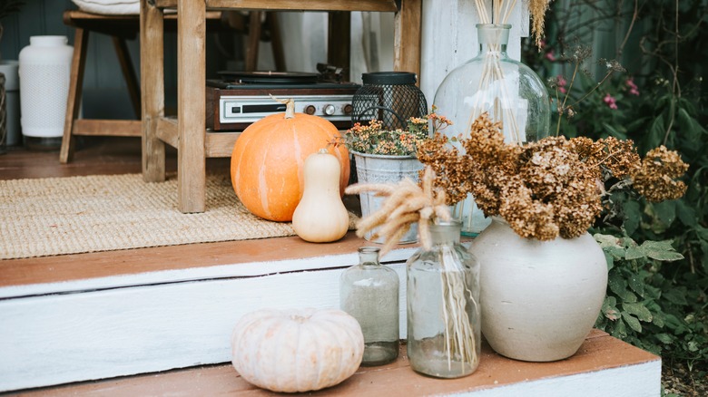 Fall porch with clear vases