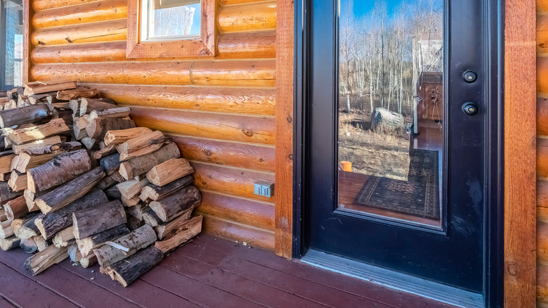 Stack of logs near door