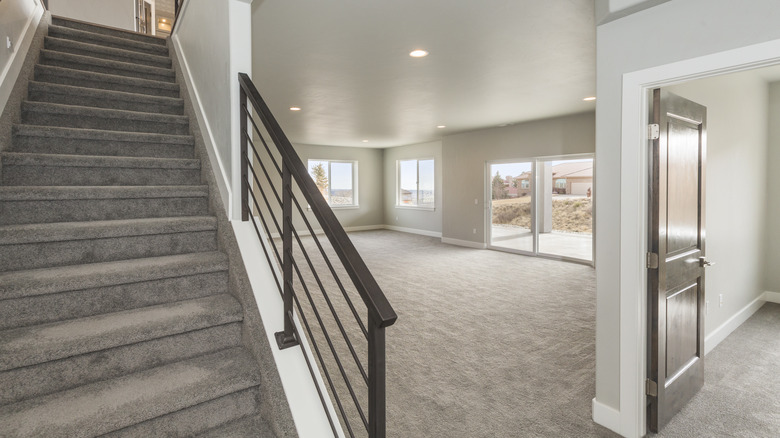 large basement with sliding doors