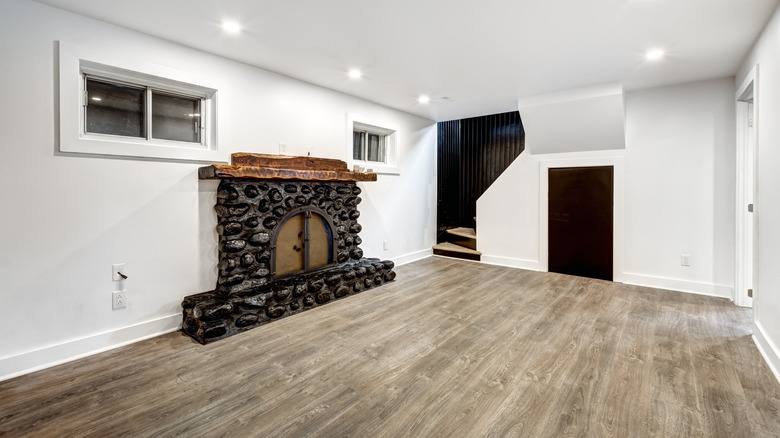 Basement with fireplace in it