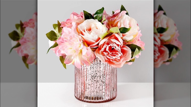 Pink flowers in pink vase