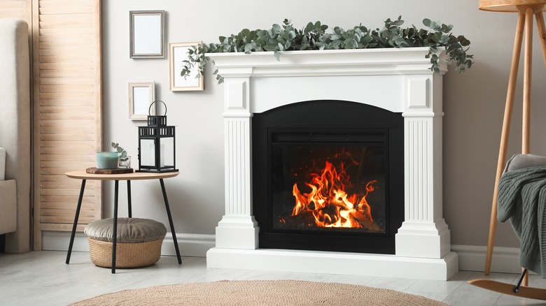 eucalyptus on a white fireplace