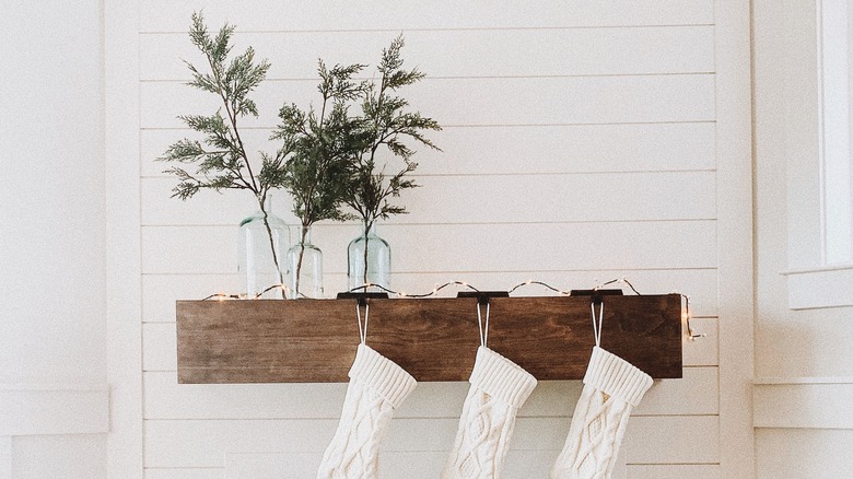 Pine branches in vases