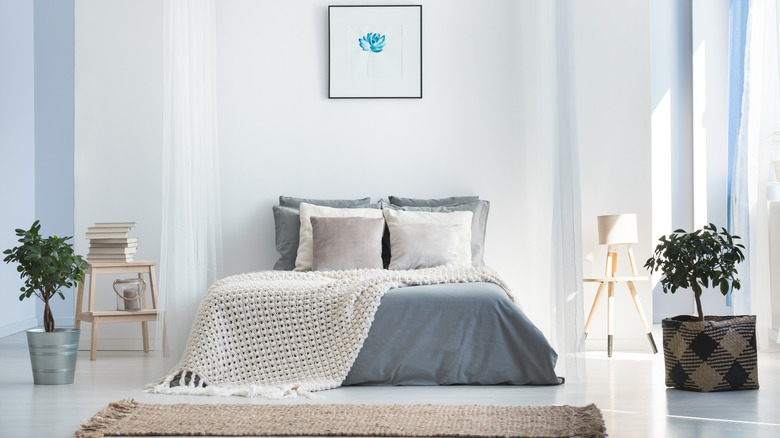 Gray blue comforter white bedroom
