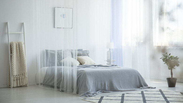 Airy blue and white bedroom