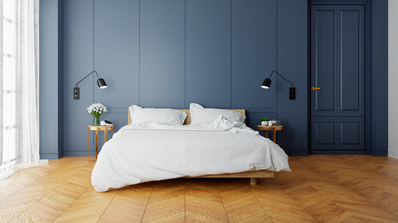Flat navy blue bedroom wall