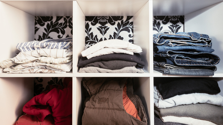 clothes on a cube shelf