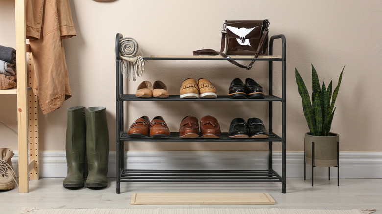 black rack with shoes