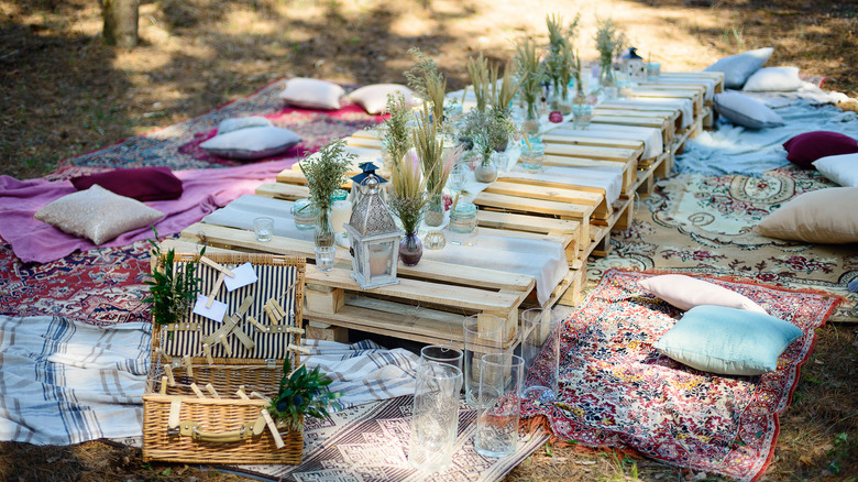 Forest-theme dinner party with herb vases