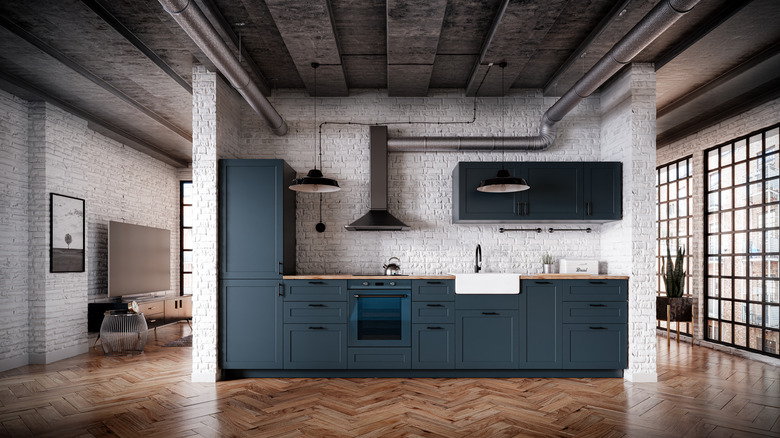 Industrial kitchen blue cabinets