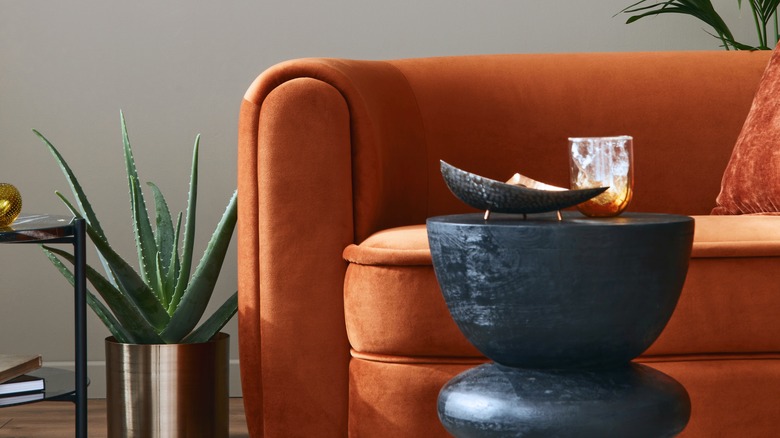 orange curved sofa