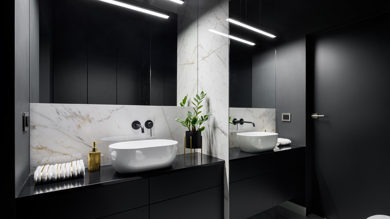 Black bathroom with marble