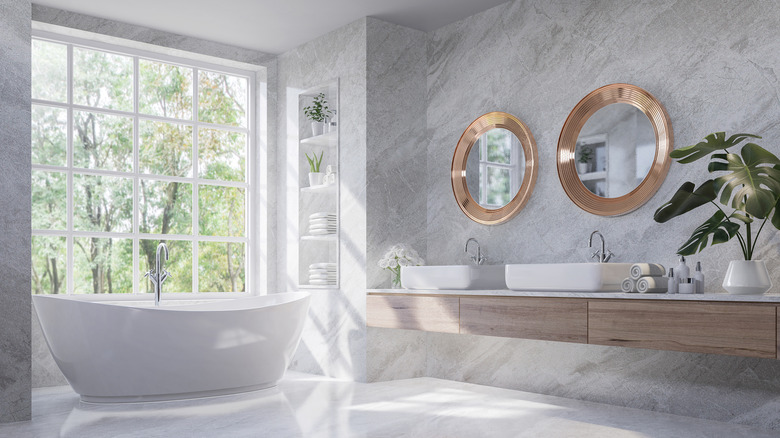 Marble bathroom with wood countertop 