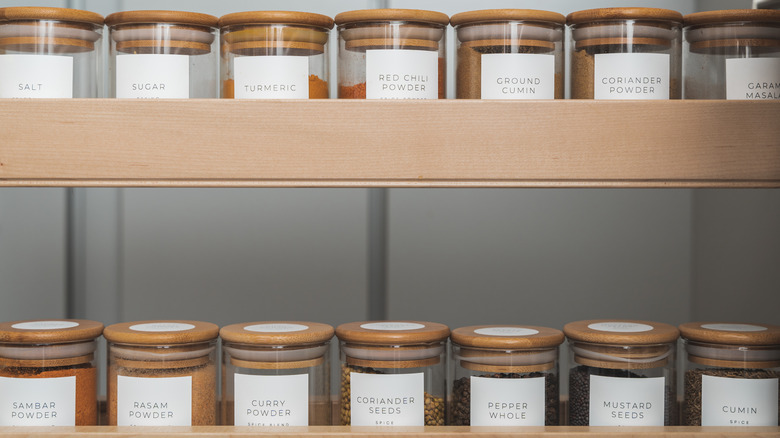 Organized spice rack of containers
