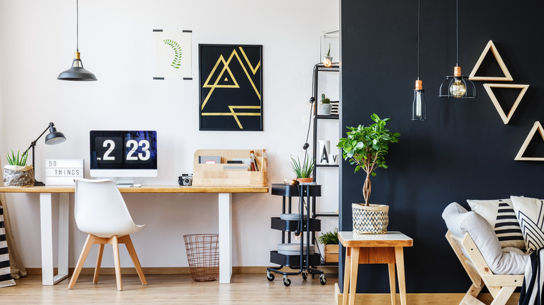 navy accent wall with desk