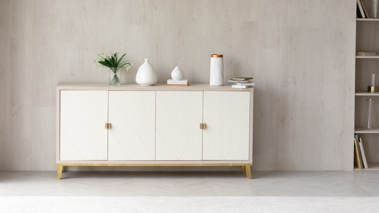 white and wood storage cabinet