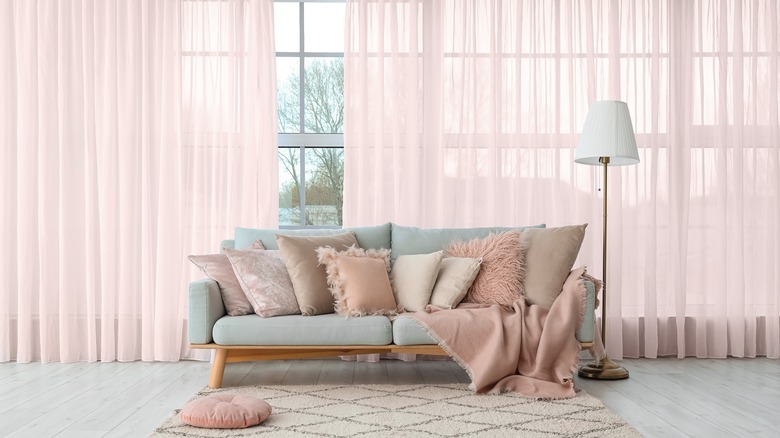 pink throw pillows on couch