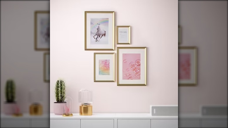 art on a pink wall