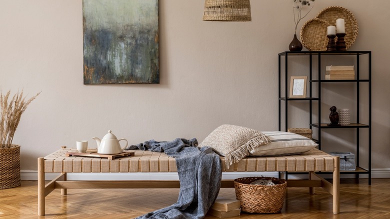 Rattan bench in pink room