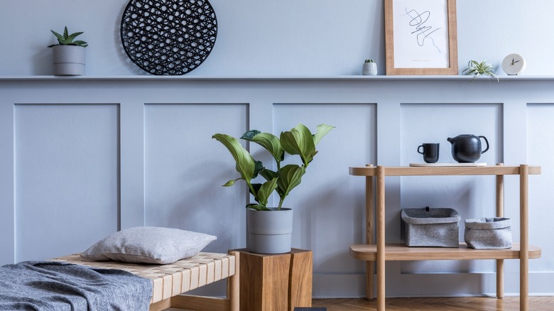 Blue room with bench and table