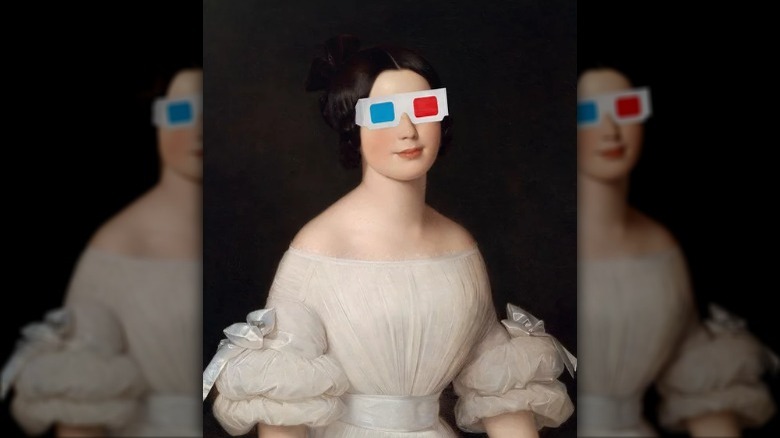 woman wearing 3D glasses