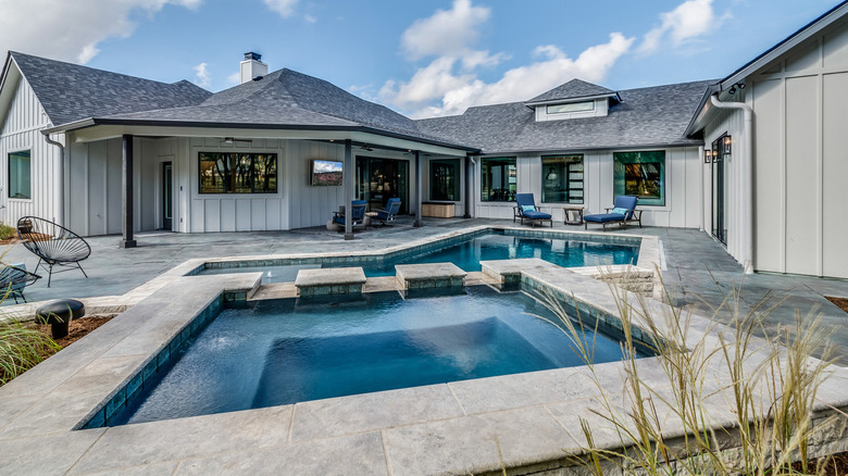 custom designed pool in backyard