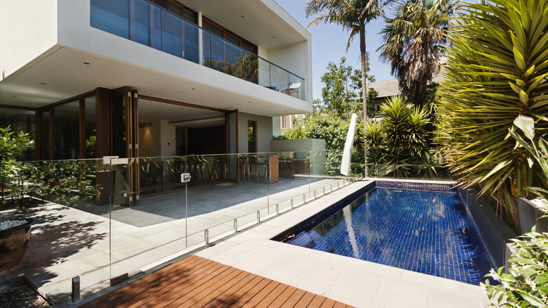contemporary home with pool
