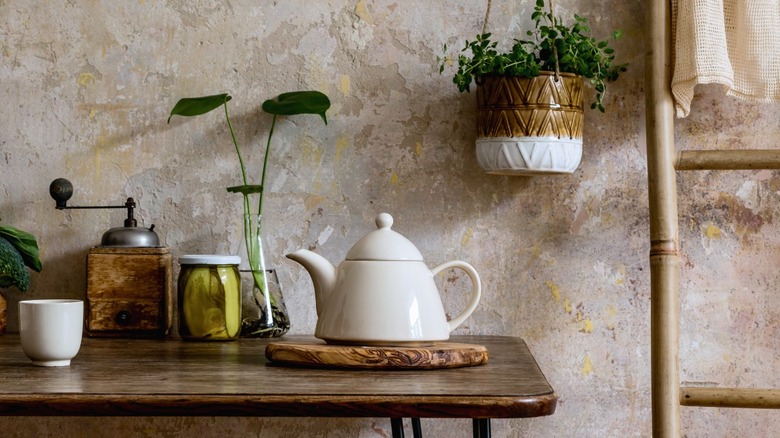 plaster kitchen wall with teapot