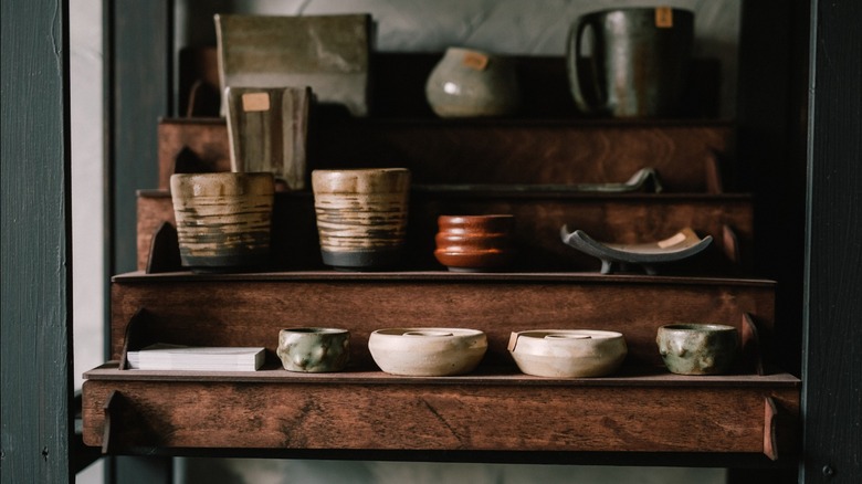 shelves of pottery